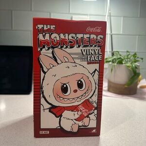NEW Coca-Cola Monsters Vinyl Box with Red and White Design